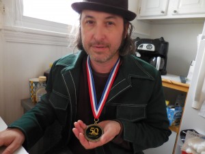 Arlan with 50th Anniversary Commemorative Medal of March from Selma to Montgomery